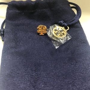 One out of Two Tory Burch Gold earring